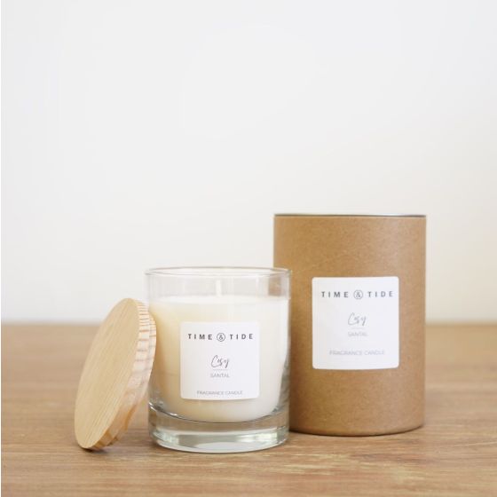 Image of a white candle with brown packaging