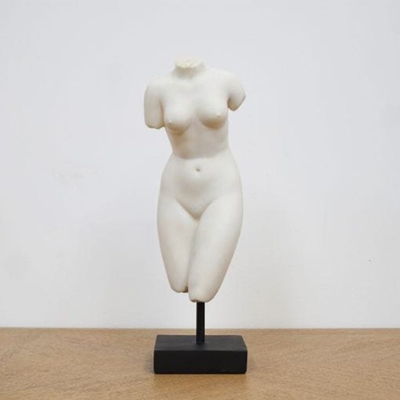 A body figure decor featuring a monochrome colour palette