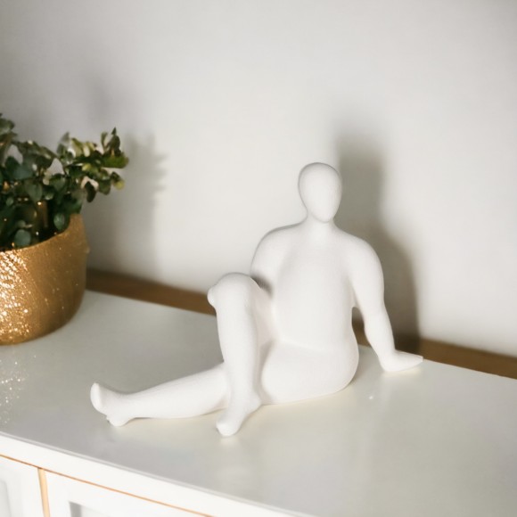 White Ceramic Reclining Figure Sculpture