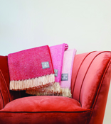 Throws Raspberry pink occasional chairs with pink throws on top