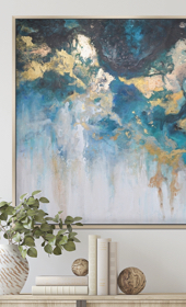 Abstract blue and gold print on wall above sideboard