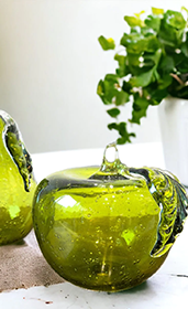 two white vases with face design on front