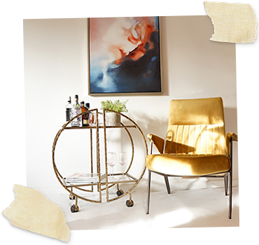 round gold bar trolley with mustard occasional chair to the right and abstract print on wall above
