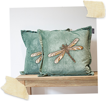 sage velvet cushions with beaded dragonfly to middle
