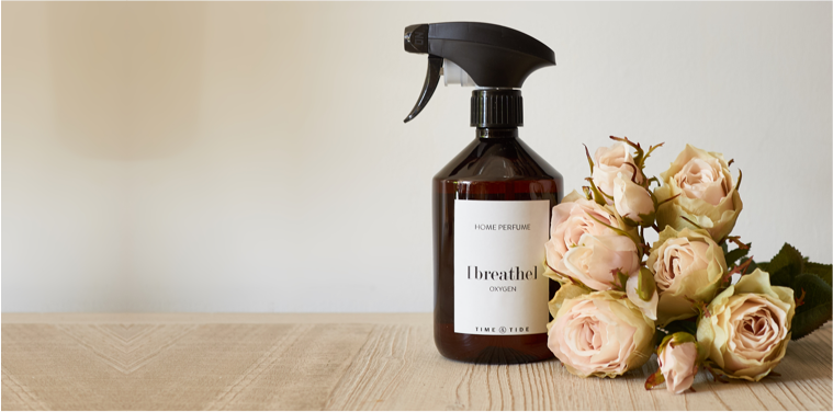 fragranced room spray bottle with flowers