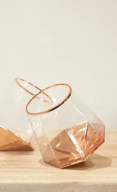 hexagonal copper drinking glasses on table