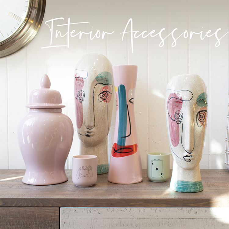 Four Vases with Face Designs and text "Interior Accessories"