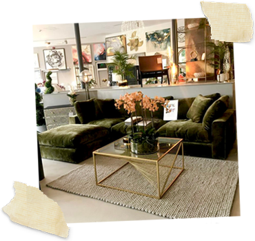 Green velvet L-shape sofa with gold coffee table in front