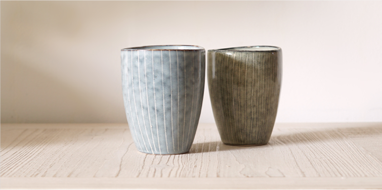 two broste copenhagen handleless mugs in blue tone
