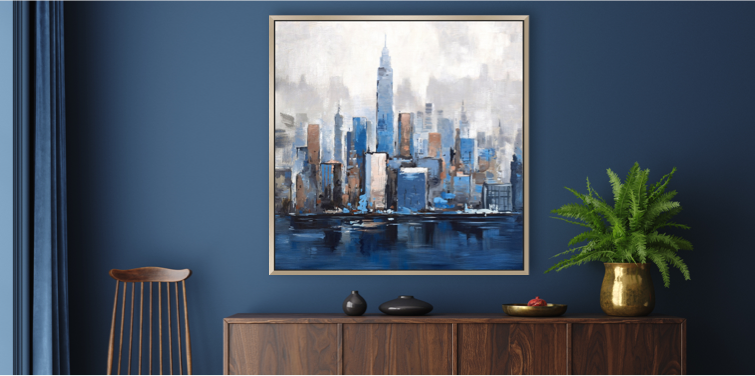 abstract wall art in tones of blue depicting a city skyline hung above dark wood sideboard